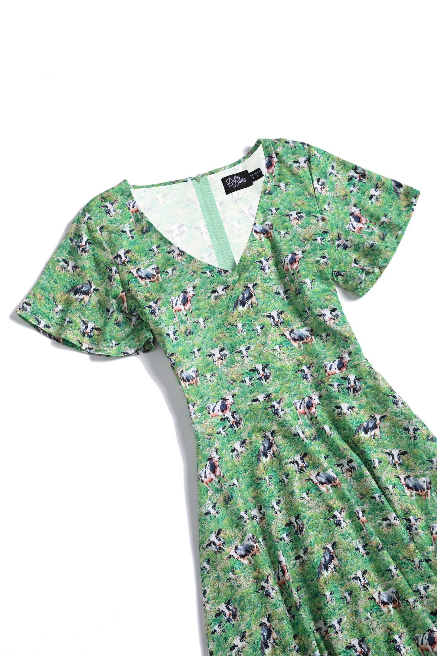 Palma Short Sleeved Tea Dress in Green Cow Field Print